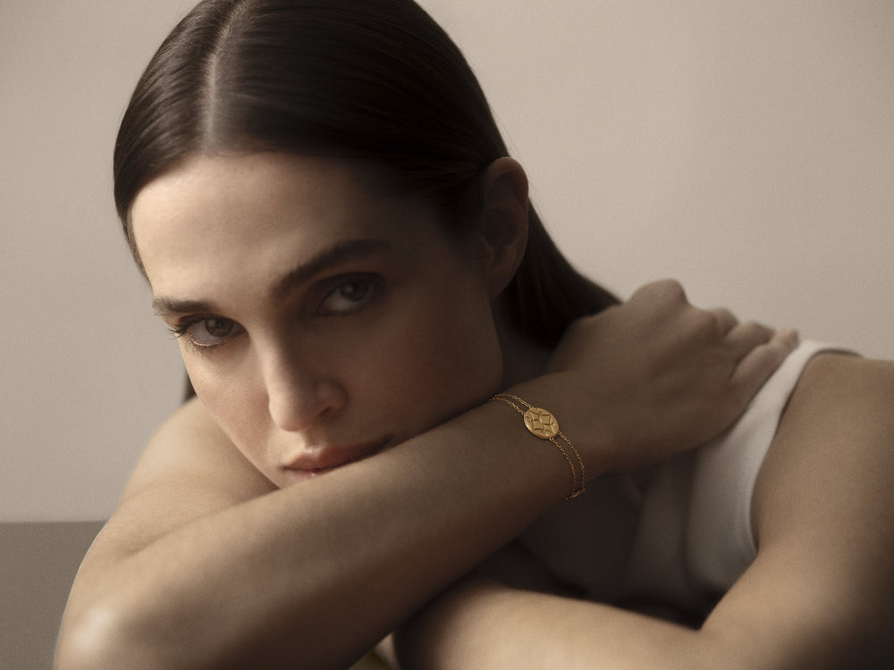 Portrait of a woman wearing an Oak Sitting bracelet