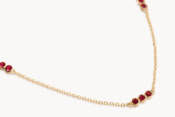 Ruby trio necklace in gold