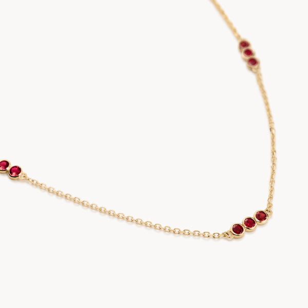 Ruby trio necklace in gold