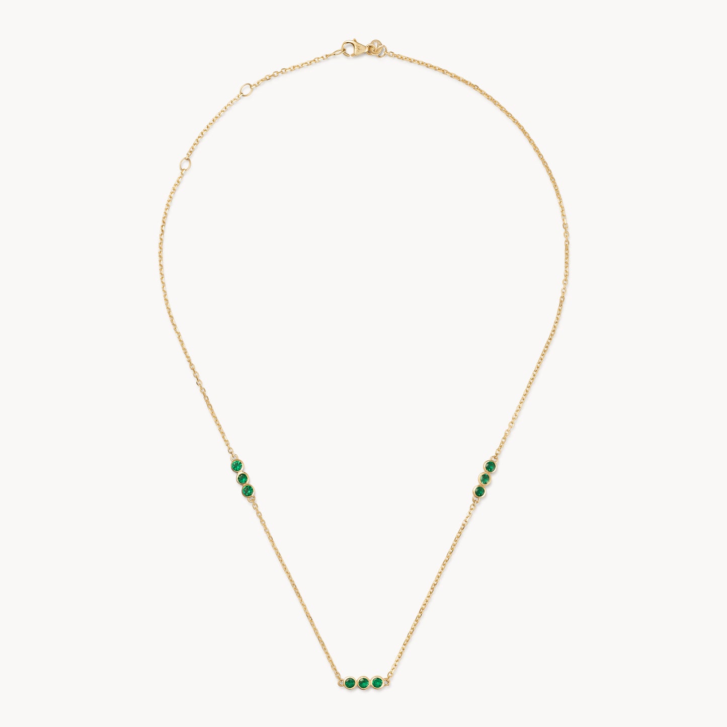 Emerald trio necklace in gold