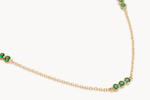Emerald trio necklace in gold