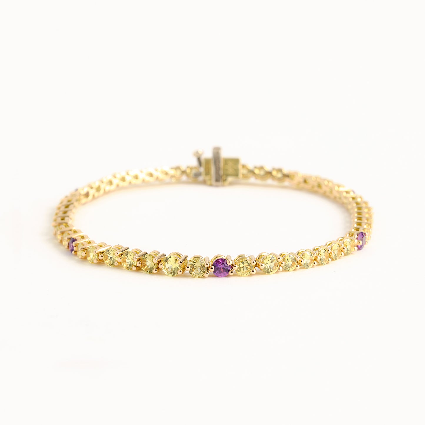 18K Yellow and Purple Sapphire Tennis Bracelet