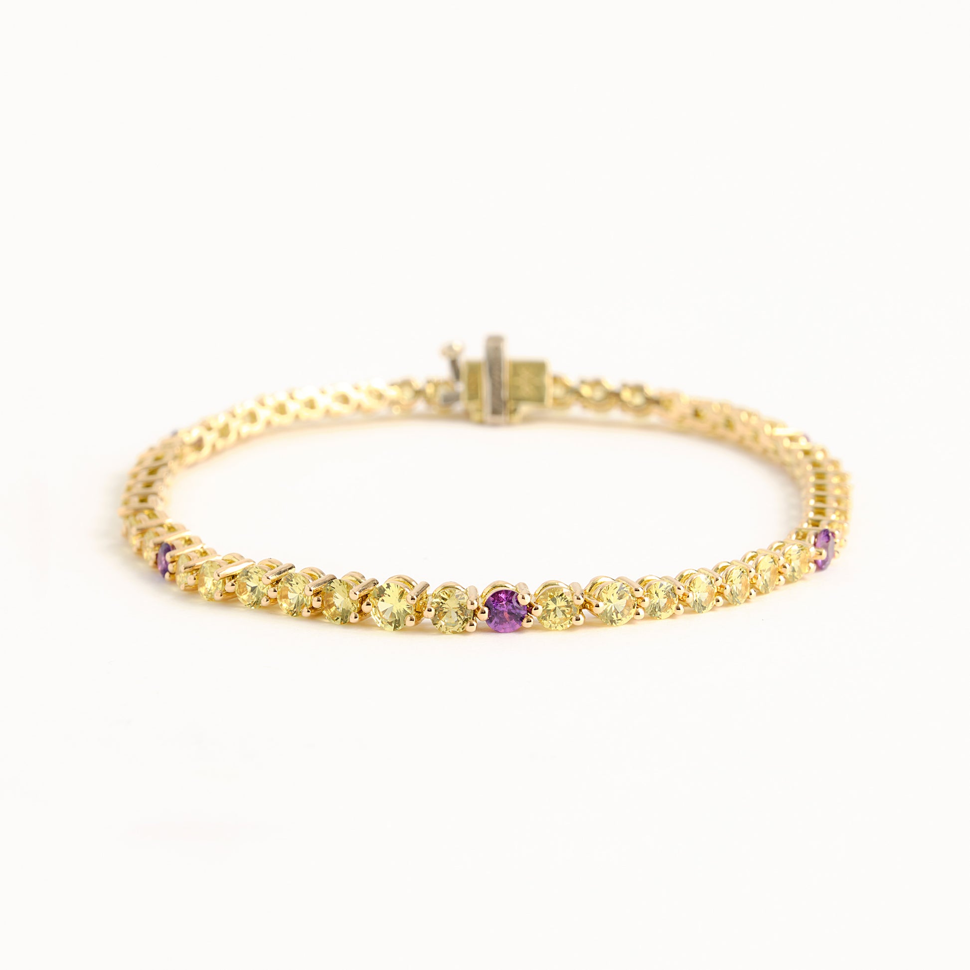 Image 1: 18K Yellow and Purple Sapphire Tennis Bracelet