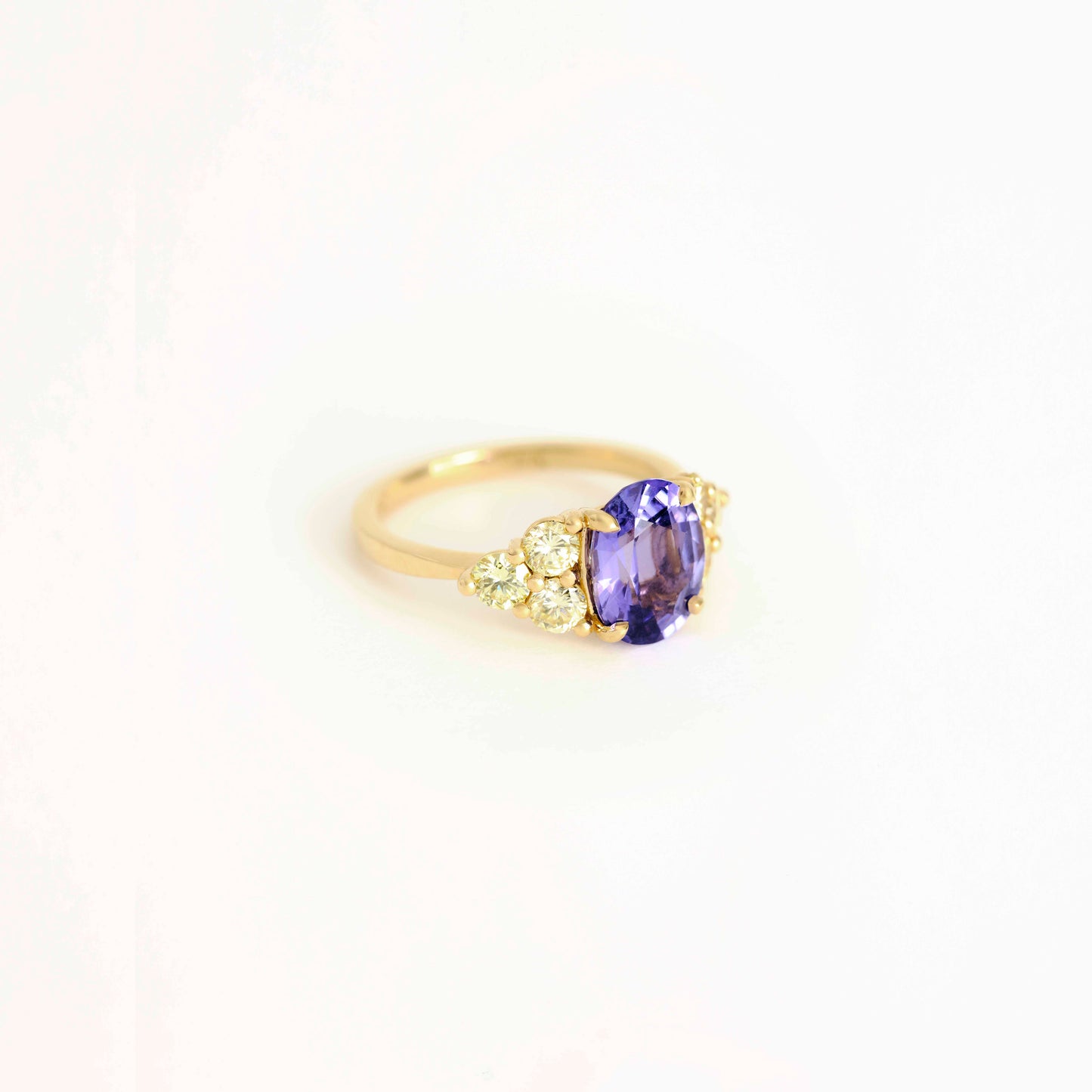 Oval Purple Sapphire and Gold Diamond Ring