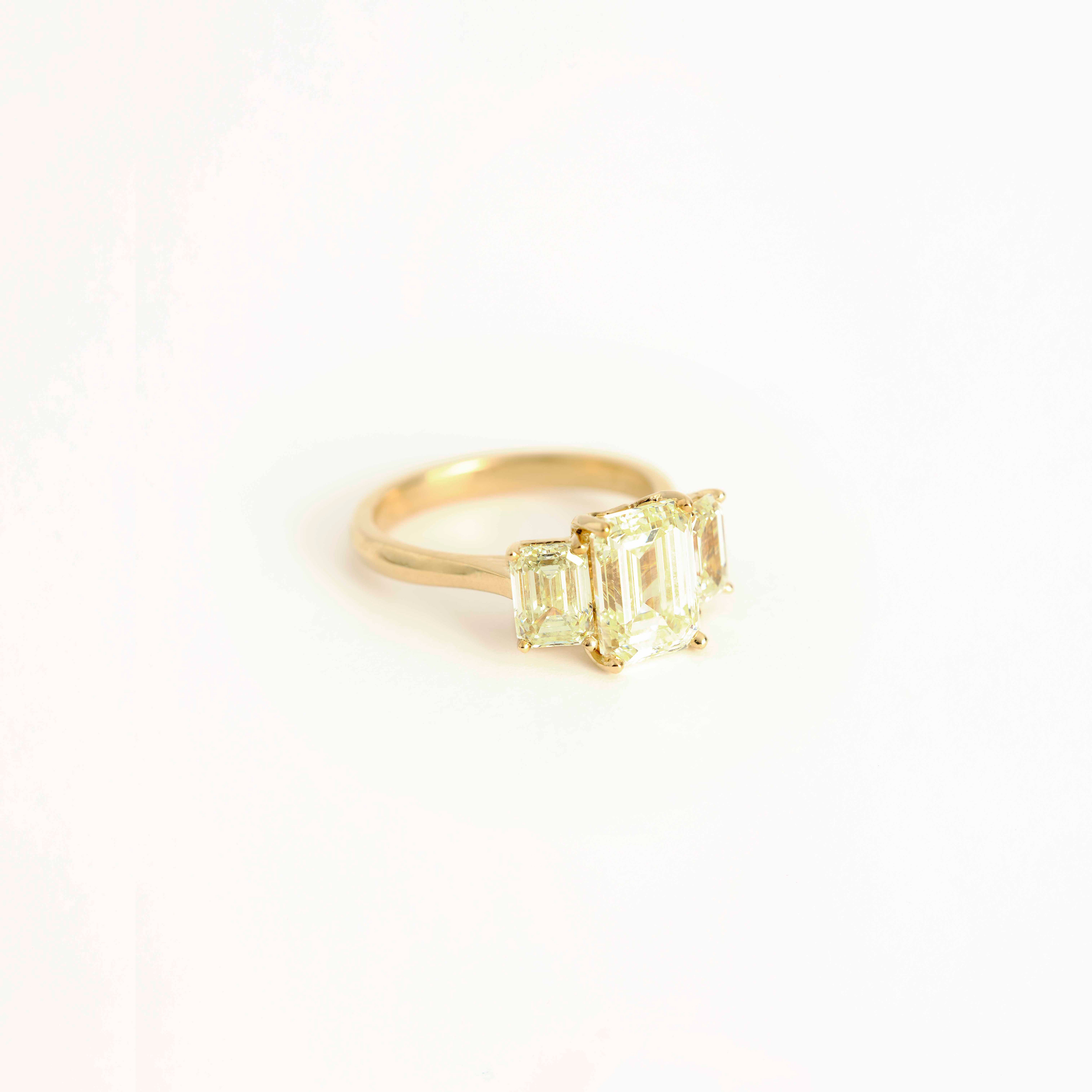 Three Stone Emerald Cut Diamond Ring